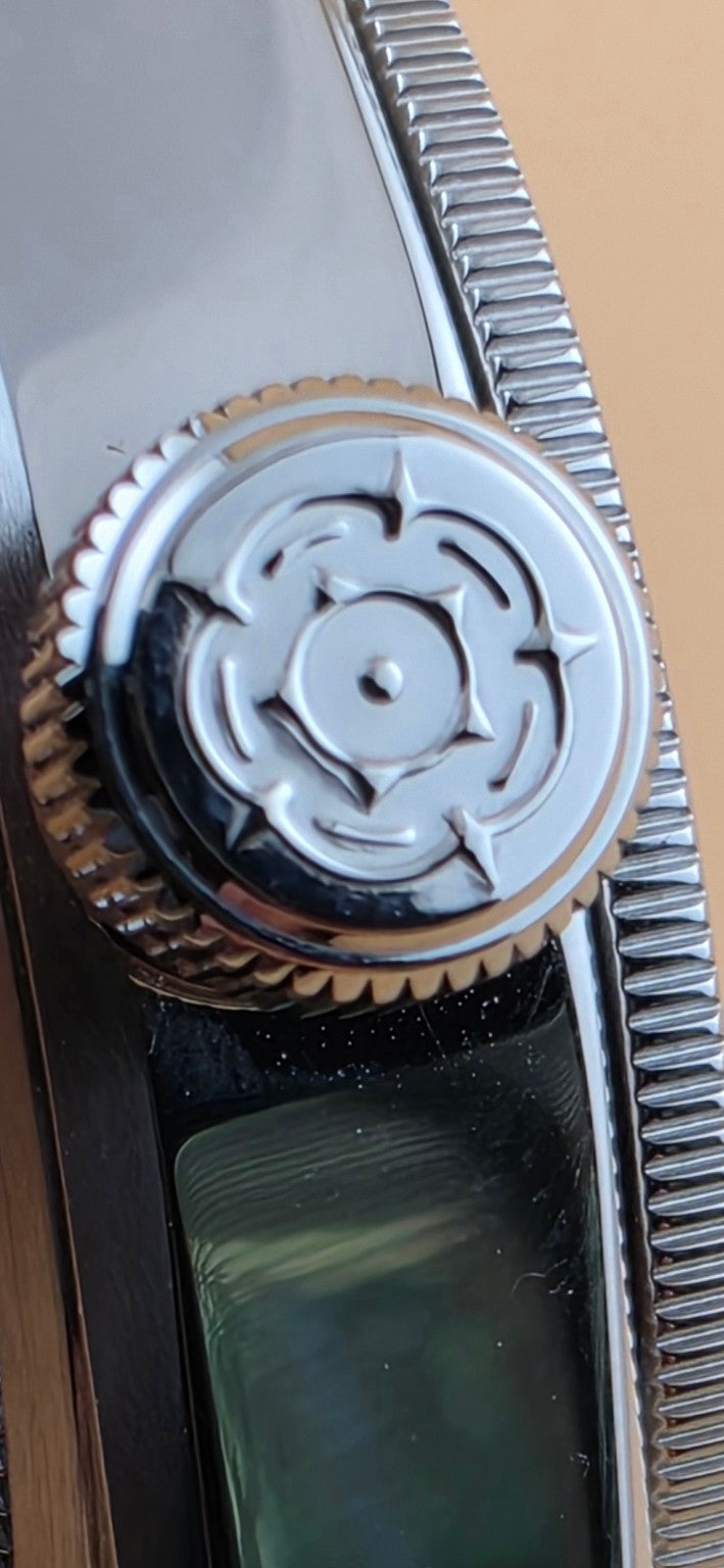 Tudor Black Bay GMT 79830RB Tudor rose winding crown close-up